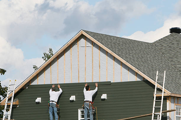 Professional Siding Contractor technician working in Karthaus, PA